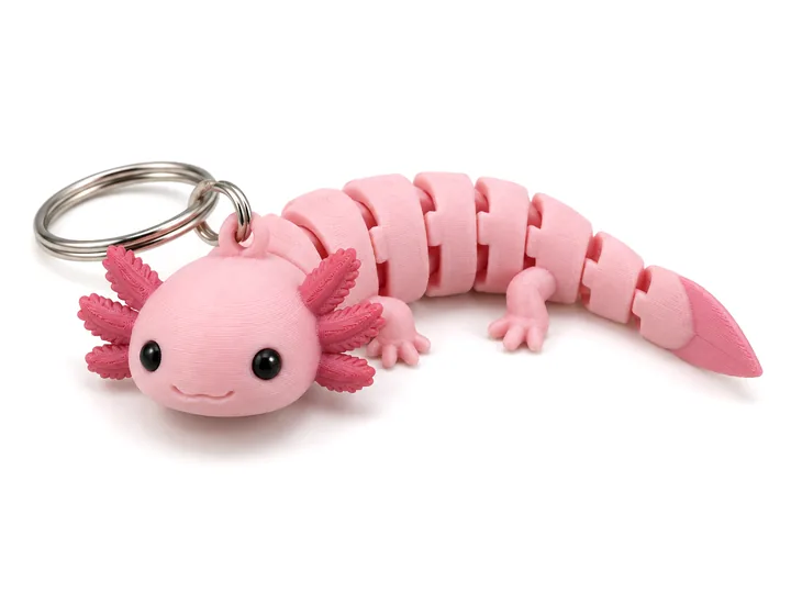 Articulated axolotl keychain in pink, on a key ring
