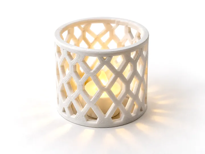 Lattice tea-light holder glowing warm